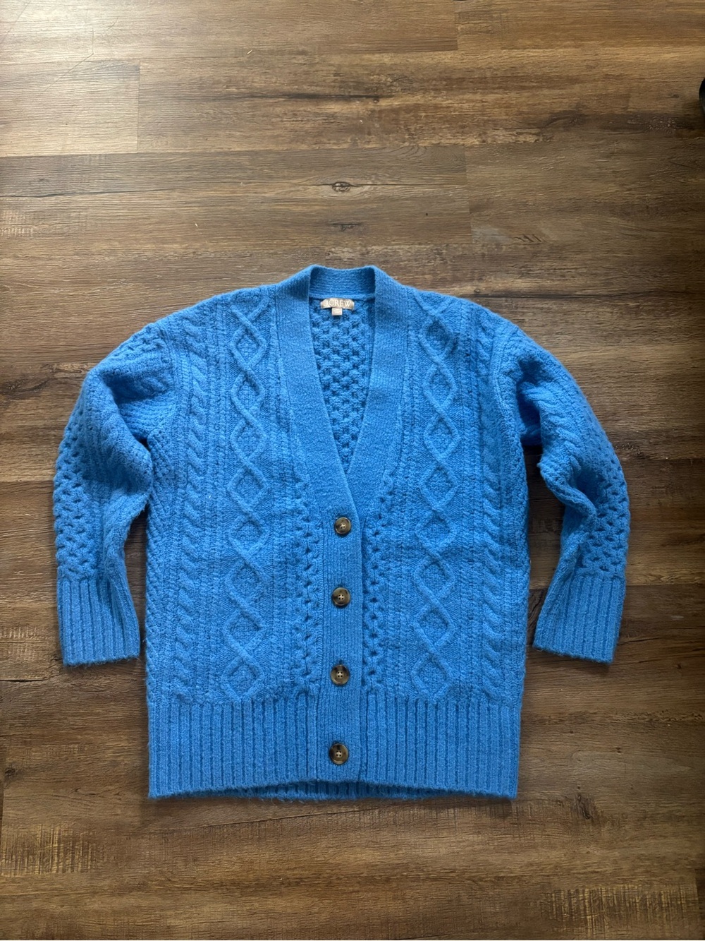 J. Crew oversized blue cable knit cardigan.